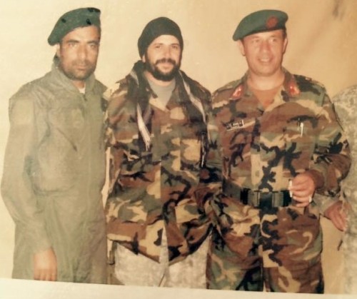 With two Afghan Army officers in Kapisa province, 2009. The soldier in green coveralls was thirty-five then, and had been fighting continuously since age fifteen. I went on many mission with him.